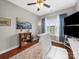 Bedroom featuring a ceiling fan, a window, and hardwood flooring at 2225 Corinth Church Rd, Monroe, NC 28112
