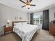 Charming bedroom featuring a ceiling fan and natural light at 2225 Corinth Church Rd, Monroe, NC 28112