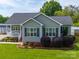 Charming one-story home with well-manicured lawn and landscaping at 2225 Corinth Church Rd, Monroe, NC 28112