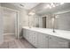 Bathroom features double sinks, ample counter space, and a well-lit mirror at 2412 Laura Dr, Charlotte, NC 28212