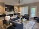Comfortable living room with stylish seating, modern fireplace, and ample natural light at 3119 Castlemaine Dr, Charlotte, NC 28269