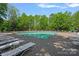 Expansive community pool with lounge chairs and a beautifully paved deck area; perfect for relaxation and recreation at 3124 Lakewood Edge Dr, Charlotte, NC 28269
