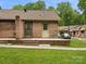 View of backyard patio with outdoor seating on a well-maintained lawn at 3164 Devonshire Dr, Rock Hill, SC 29732