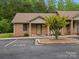 Charming brick home featuring a manicured lawn and ample parking space for residents and visitors alike at 3164 Devonshire Dr, Rock Hill, SC 29732