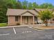 Charming brick home featuring a manicured lawn and ample parking space for residents and visitors alike at 3164 Devonshire Dr, Rock Hill, SC 29732