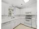 Bright kitchen with white cabinets, modern appliances, and a view to the outdoors from above the sink at 3164 Devonshire Dr, Rock Hill, SC 29732