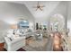 Bright living room with high ceilings, hardwood floors, and lake views at 3507 Governors Island Dr, Denver, NC 28037