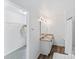 Bathroom featuring a double vanity with granite countertops, a shower with curtain, and a walk-in closet at 355 Jared Steel Ln, Salisbury, NC 28146