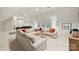 Inviting open concept living space perfect for gatherings, featuring a game table and comfortable seating at 3950 Abingdon Rd, Charlotte, NC 28211