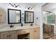 Bathroom with double vanity, modern fixtures, and a glass-enclosed shower at 4145 Wrangler Sw Dr, Concord, NC 28027