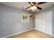Clean and simple bedroom with closet and ceiling fan at 4145 Wrangler Sw Dr, Concord, NC 28027