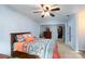 Spacious bedroom featuring patterned bedding, and a walk-in closet at 4145 Wrangler Sw Dr, Concord, NC 28027