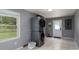 Laundry room with a washer and dryer, a utility sink, and a view to the backyard at 4145 Wrangler Sw Dr, Concord, NC 28027