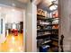 Pantry with storage shelving and a view to the kitchen at 4145 Wrangler Sw Dr, Concord, NC 28027
