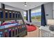 Shared ' room with bunk beds, a separate bed, and plenty of natural light at 4316 Nesbit Rd, Monroe, NC 28112