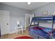 Playful ' bedroom with bunk beds, a small table, and a fun, colorful design at 4316 Nesbit Rd, Monroe, NC 28112