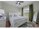 Comfortable bedroom with soft lighting, neutral tones, and a view of the outdoors at 4316 Nesbit Rd, Monroe, NC 28112