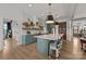 Well-appointed kitchen with a sizable island, pendant lighting, and ample cabinet space for storage at 4316 Nesbit Rd, Monroe, NC 28112