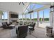 Inviting sunroom with stone fireplace, vaulted ceilings, and expansive views of the backyard at 4316 Nesbit Rd, Monroe, NC 28112