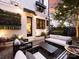 Inviting backyard features a seating area, vertical garden, stylish furniture, and a barbecue grill, perfect for outdoor entertaining at 443 Beaumont Ave, Charlotte, NC 28204