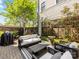 Inviting backyard patio with stylish seating, grill, and lush landscaping, perfect for outdoor relaxation and entertaining at 443 Beaumont Ave, Charlotte, NC 28204