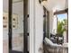 Charming outdoor balcony seating area with comfortable chairs perfect for enjoying neighborhood views at 443 Beaumont Ave, Charlotte, NC 28204