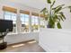 Bonus room featuring ample windows for natural light and wood flooring perfect for an office space at 443 Beaumont Ave, Charlotte, NC 28204