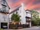 Beautiful painted brick home featuring a side entry garage and well-manicured landscaping at 443 Beaumont Ave, Charlotte, NC 28204