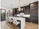 Gourmet kitchen features a large island with seating and stainless steel appliances at 443 Beaumont Ave, Charlotte, NC 28204