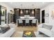 Stylish kitchen featuring dark cabinets, quartz countertops, and pendant lighting at 443 Beaumont Ave, Charlotte, NC 28204