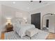 Bright bedroom featuring a cozy bed, plush rug, and stylish decor at 4635 Harper Ct, Charlotte, NC 28210