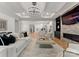 Spacious living room with modern decor, hardwood floors, fireplace, and comfortable seating at 4635 Harper Ct, Charlotte, NC 28210