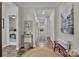 Inviting home hallway with hardwood floors, neutral walls, and decorative accents creating a warm, welcoming atmosphere at 5104 Samoa Ridge Dr, Lancaster, SC 29720