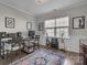 Home studio with desk, guitars, speakers, and a large window for natural light and a creative space at 5104 Samoa Ridge Dr, Lancaster, SC 29720