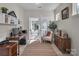 Bright home office featuring a desk, chair, cabinet and shelving, with natural light from the outside at 5104 Samoa Ridge Dr, Lancaster, SC 29720
