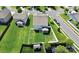 An aerial view shows this home's large fenced backyard in a well-maintained neighborhood with mature landscaping and manicured lawns at 5146 Elementary View Dr, Charlotte, NC 28269