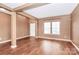 Versatile living space with wood floors, neutral walls, and ample natural light, ready for personalization at 5146 Elementary View Dr, Charlotte, NC 28269