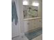 Elegant bathroom featuring double sinks, granite countertops, and tiled floors at 5817 Wingate Hill Rd, Denver, NC 28037