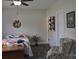 Cozy bedroom featuring a comfortable bed, decorative accents, and a sitting area at 5817 Wingate Hill Rd, Denver, NC 28037