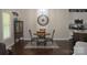Charming dining area with a round table, stylish chairs, and adjacent kitchen access at 5817 Wingate Hill Rd, Denver, NC 28037
