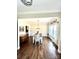 Traditional dining room with hardwood floors, chandelier, and a table set for six at 5817 Wingate Hill Rd, Denver, NC 28037