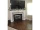 Bright living room with fireplace and television at 5817 Wingate Hill Rd, Denver, NC 28037