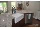 Beautiful kitchen with a large farmhouse sink, granite countertops, and stainless steel appliances at 5817 Wingate Hill Rd, Denver, NC 28037