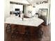 Bright kitchen featuring white cabinets, stainless steel appliances, and a large island with seating at 5817 Wingate Hill Rd, Denver, NC 28037