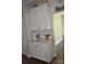 Bright kitchen with white cabinets, granite countertops, and stainless steel appliances at 5817 Wingate Hill Rd, Denver, NC 28037