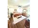 Serene main bedroom with a king-size bed, dresser, and natural light at 5817 Wingate Hill Rd, Denver, NC 28037