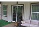 Outdoor living space featuring a comfortable seating area, providing a relaxing spot with views of the backyard at 5817 Wingate Hill Rd, Denver, NC 28037