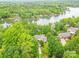 Expansive lakefront property showcasing mature trees, pristine waterfront and multiple homesites at 5951 Johnson Rd, Clover, SC 29710