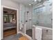 Modern bathroom featuring a glass-enclosed shower, with bedroom access at 5951 Johnson Rd, Clover, SC 29710