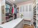 Well-organized walk-in closet with shelving, drawers, and window seat at 5951 Johnson Rd, Clover, SC 29710